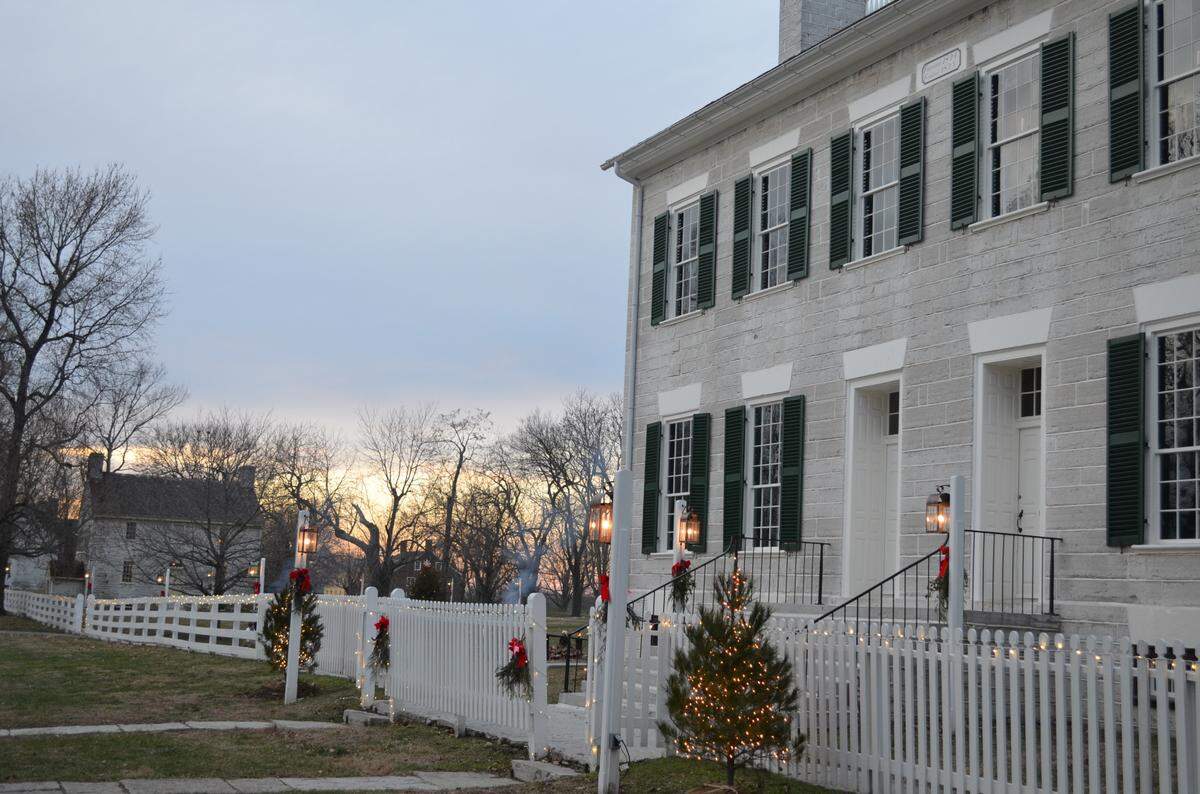 Shaker Village of Pleasant Hill is lighted up for the holidays during the annual Illuminated Evenings.