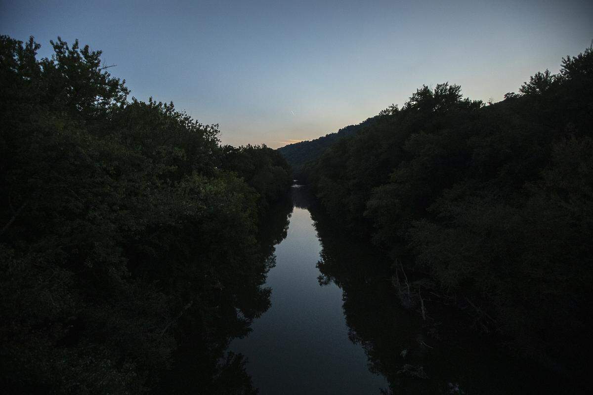 Dusk falls over Levisa Fork in Pikeville Thursday, Sept. 12, 2019.