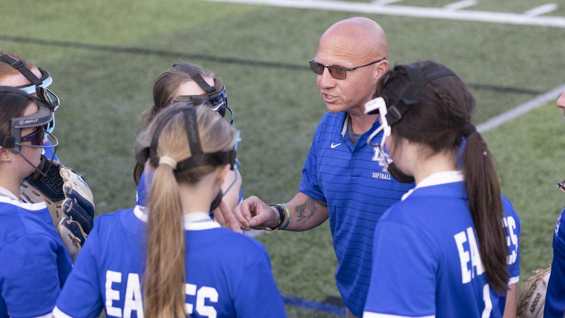 Lexington Christian coach Chris Waits talks to his team ahead of the bottom of the seventh inning during the Eagles’ 7-5 win at Lexington Catholic on Thursday.