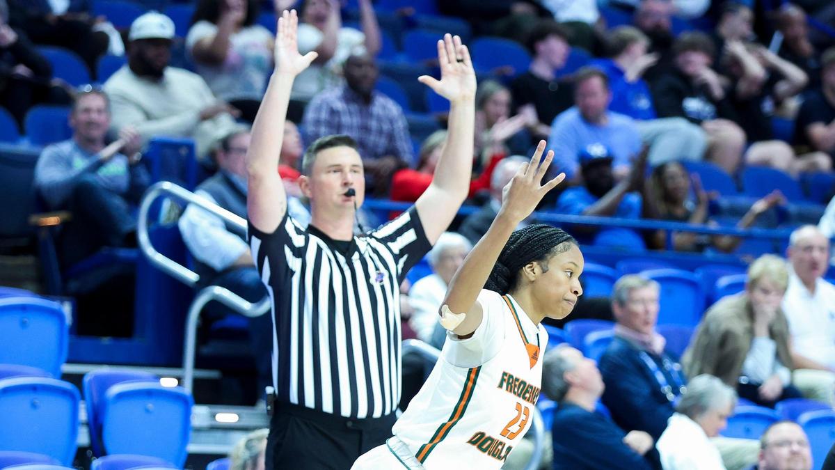 Frederick Douglass’ Jaelee Knowles (23) celebrates after a second-half three-pointer during a first-round game against Simon Kenton in the 2025 Clark’s Pump-N-Shop Girls’ Basketball Sweet 16 Wednesday at Rupp Arena.
