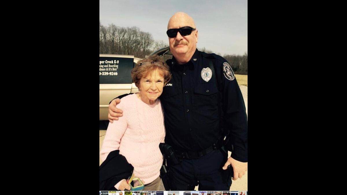 Billie Clark, 89, has worked for Walmart for 36 years. She’s shown here with her son Dennis Clark, an officer with the Strathmoor Village Police Department near Louisville.