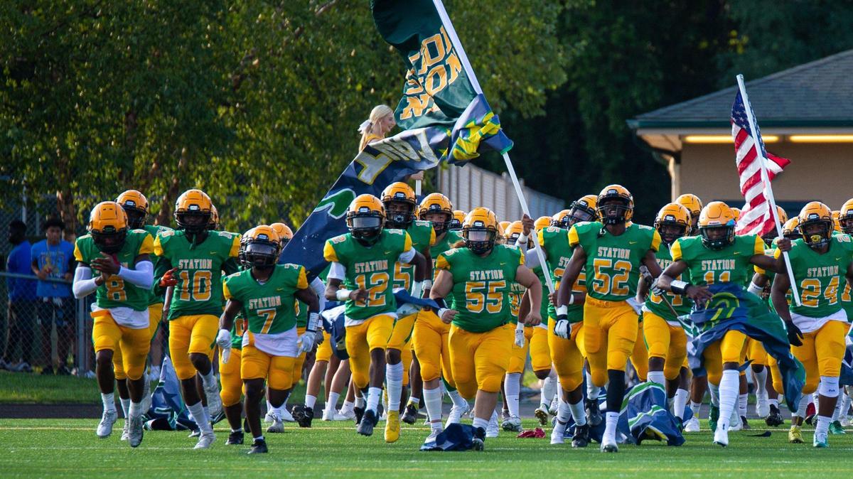 Bryan Station’s football team took the field before the game against Frederick Douglass on Friday, Aug. 20, 2021, at Bryan Station High School.
