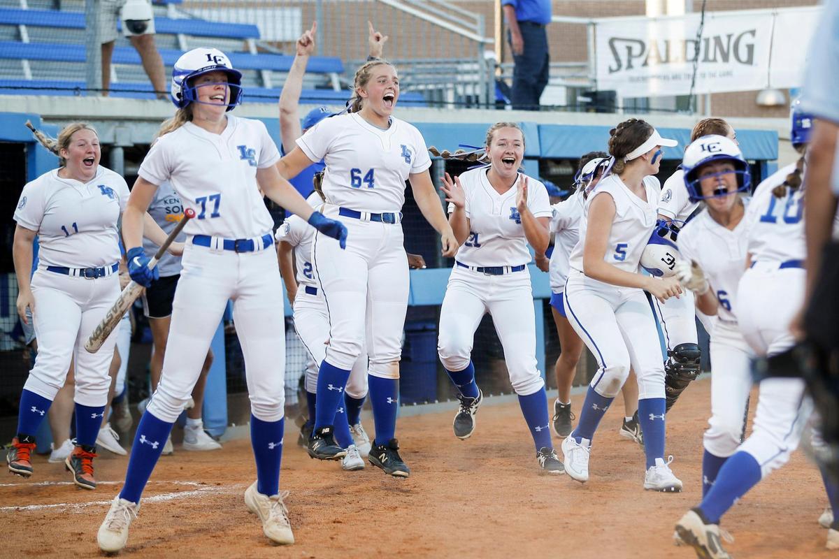 Lexington Catholic players celebrate their walk-off win over Boyle County at UK’s John Cropp Stadium on Friday night.
