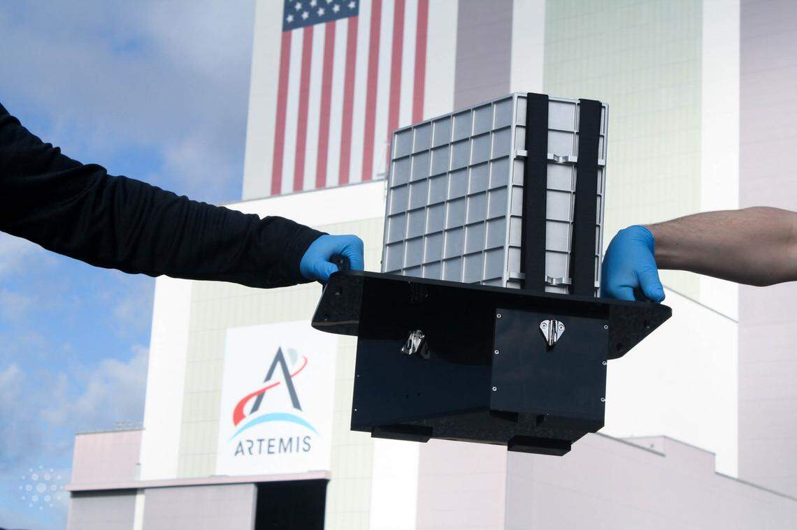 The AVATAR payload structure, designed by Space Tango, can be seen in front of the Vehicle Assembly Building at NASA Kennedy Space Center in Cape Canaveral, Fl.