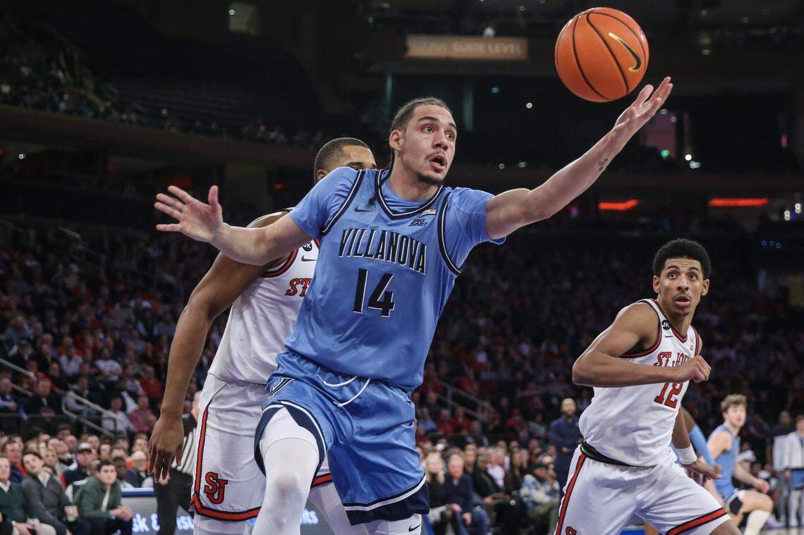 Jan 24, 2024; New York, New York, USA;  Villanova Wildcats forward Lance Ware (14) reaches for the ball in the first half against the St. John's Red Storm at Madison Square Garden. Mandatory Credit: Wendell Cruz-USA TODAY Sports