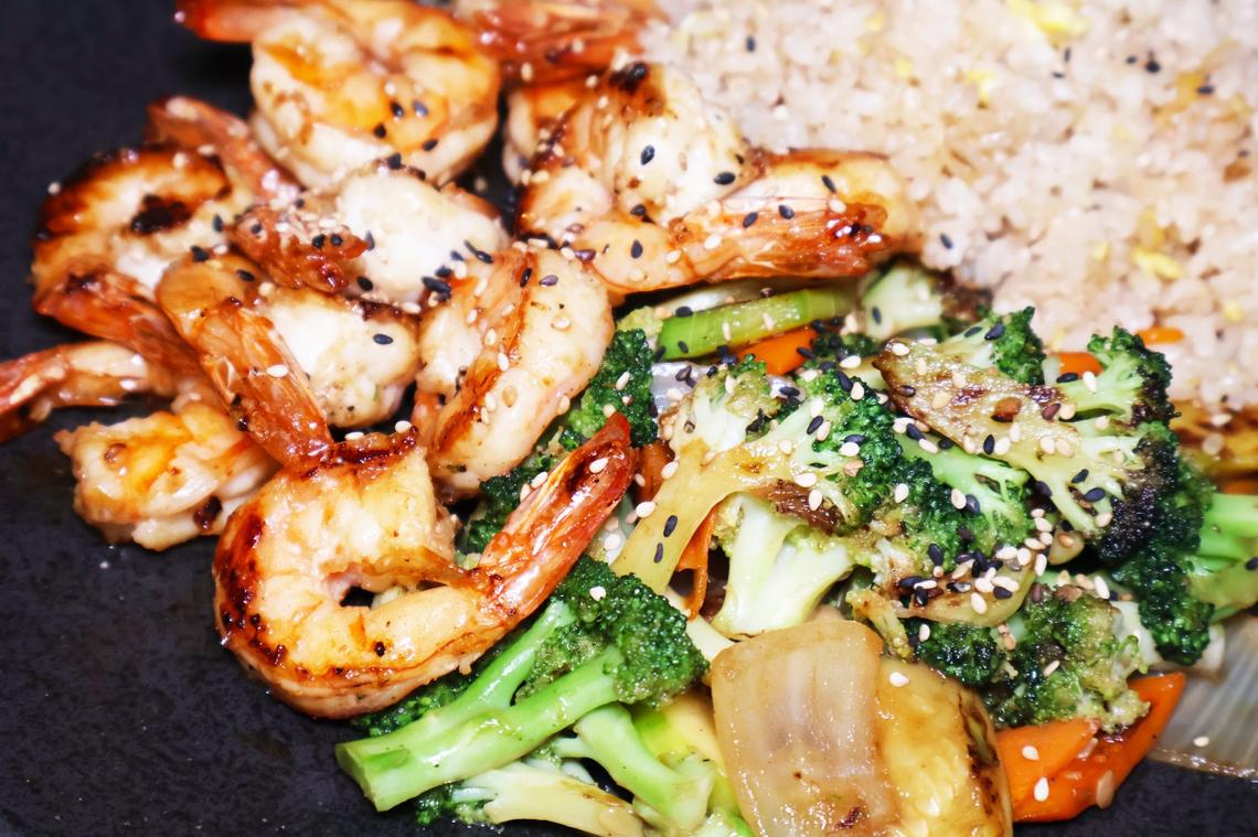 Sizzling hibachi shrimp with steamed vegetables come to the table piping hot at the new Osaka.