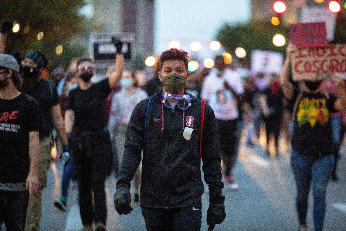 Protesters march through the street of downtown in protest of the decision concerning the officers involved in the killing of Breonna Taylor announced earlier today in Louisville, Ky., Wednesday, September 23, 2020. One officer was charged with wanton endangerment, but not in the killing of Breonna Taylor.