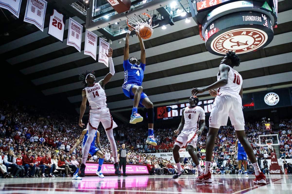 Freshman Daimion Collins (4) came off the bench to contribute 10 points and six rebounds Saturday night. He was joined in double-figure scoring by TyTy Washington (15), Kellan Grady (10), Oscar Tshiebwe (10) and Keion Brooks (10).