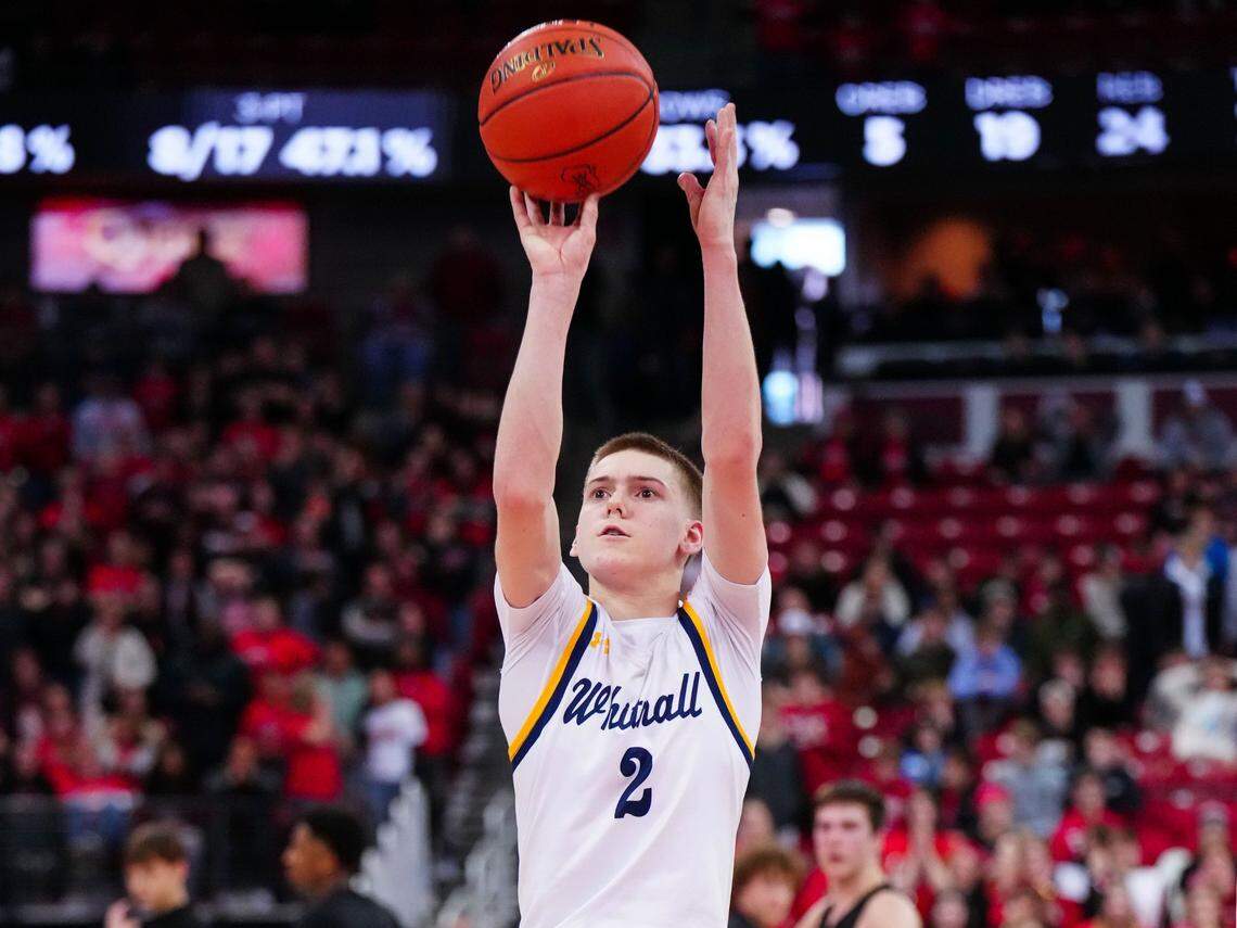 Whitnall's Myles Herro (2) hits a free throw with no time left on the clock to win the WIAA Division 2 state boys basketball semifinal, 53-52, over La Crosse Central at the Kohl Center in Madison on Friday, March 17, 2023.State Bball17 0591