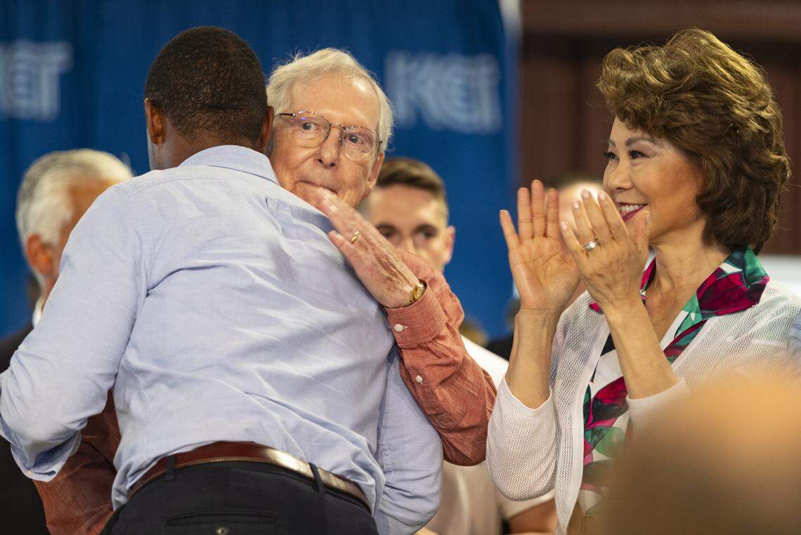 Senator Mitch McConnell hugs Gubernatorial candidate Daniel Cameron during the 143rd Fancy Farm Picnic on Saturday, Aug. 5, 2023.