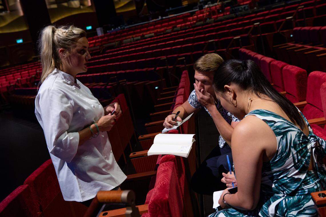 “Top Chef” final three contestant Kelsey Barnard Clark strategizes with chefs Brandon Rosen and Nini Nguyen ahead of the final competition.