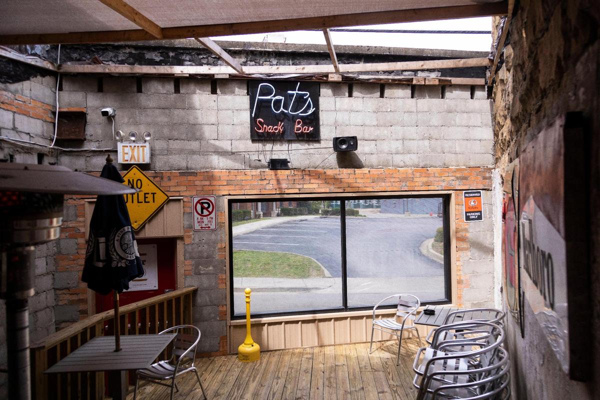 The patio area at Pat’s Snack Bar offers an area for patrons to smoke and enjoy seating on a deck in Manchester, Ky., Friday, April 15, 2022.