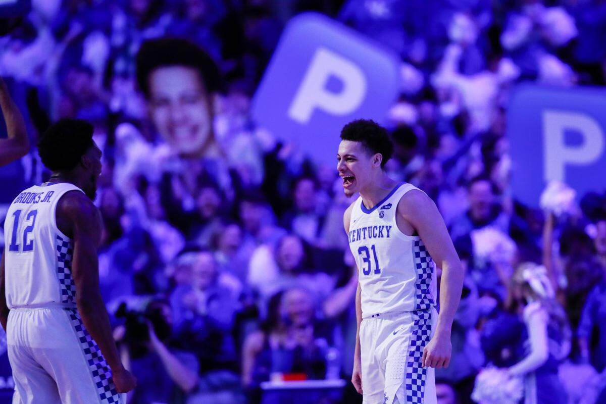 Kentucky Wildcats guard Kellan Grady (31) celebrates hitting a three point shot to take the lead from the Alabama Crimson Tide at the end of the first half during the game at Rupp Arena in Lexington, Ky., Saturday, February 19, 2022.