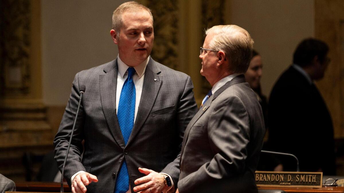 Sen. Whitney Westerfield speaks with Sen. Damon Thayer on the senate floor during the legislative session at the Capitol in Frankfort, Ky, Tuesday, January 23, 2024.