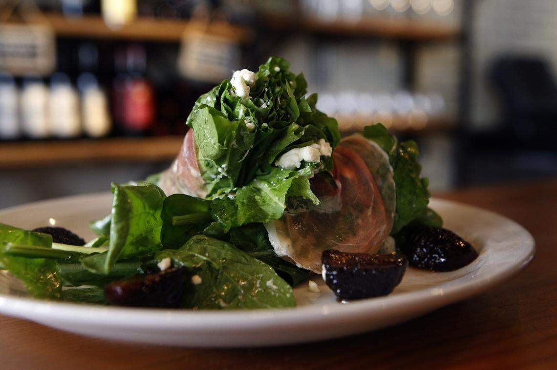 Rocket salad at Crust in 2014 featured arugula, poached figs, prosciutto, goat’s milk cheese and lemon extra virgin olive oil.