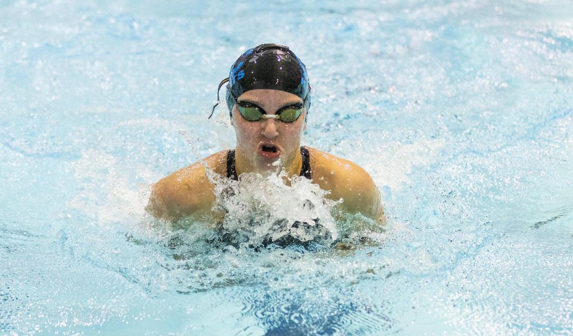 Lexington Catholic’s Mia Jones competes in the 100 breaststroke championship final heat during the 2025 KHSAA State Swimming and Diving Championships at the University of Kentucky’s Lancaster Aquatic Center on Friday.