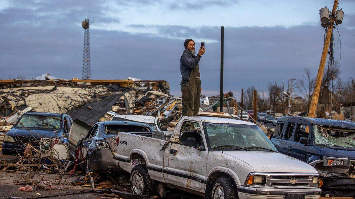 Brad Marshall, of Mayfield, surveys the damage on Saturday, Dec. 11, 2021. A deadly tornado ripped through the region Friday.