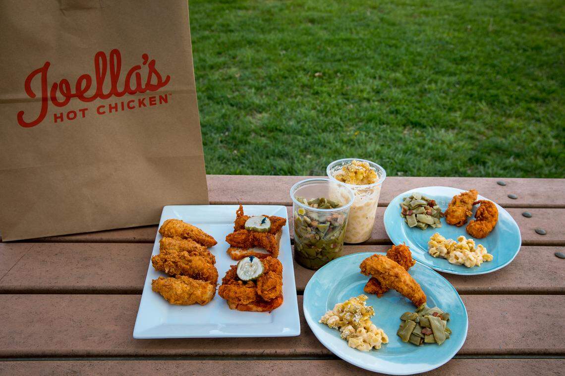 Joella’s Hot Chicken has family meals that include chicken, dipping sauces and sides.
