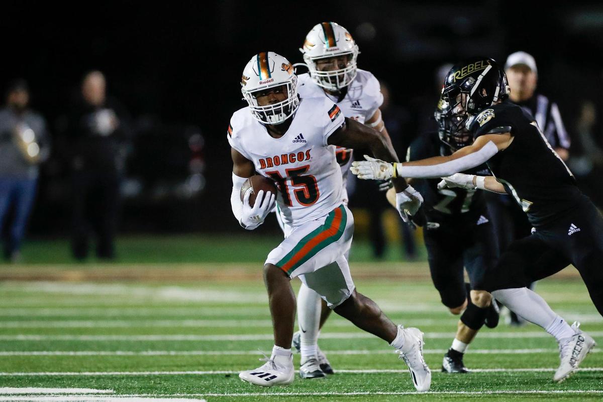 TJ Horton (15) and Frederick Douglass are seeking the school’s first football state championship Saturday night against Bowling Green. The Broncos have reached the state finals twice previously.