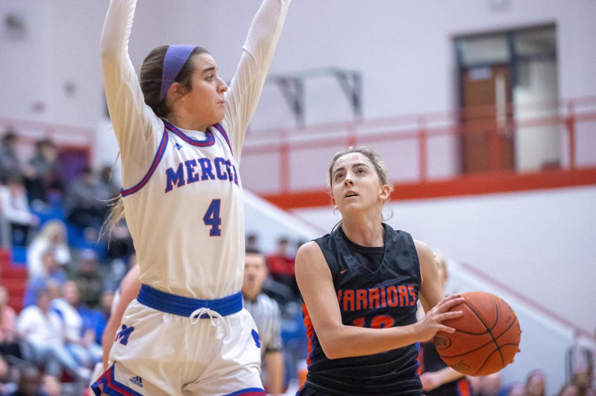 Southwestern’s Ayden Smiddy (10) looks to shoot against Mercer County’s Anna Drakeford (4) on Thursday night in Harrodsburg. Smiddy and Mercer County’s Timberlynn Yeast were named co-12th Region players of the year on Friday.