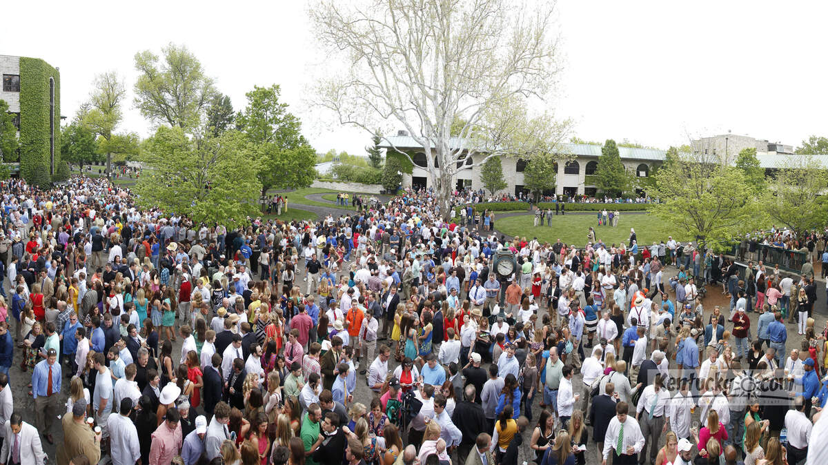 A huge crowd filled the paddock area before  the 88th running of the Blue Grass Stakes on Saturday  April 14, 2012 in Lexington, Ky. Photo by Mark Cornelison | Staff