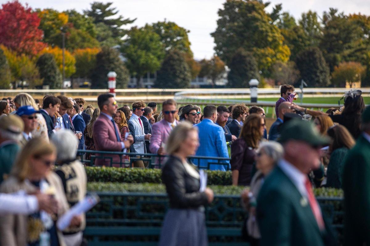 Spectators watch a race on the first day of the Keeneland Fall 2022 Meet in Lexington, Ky., on Friday, Oct. 7, 2022.