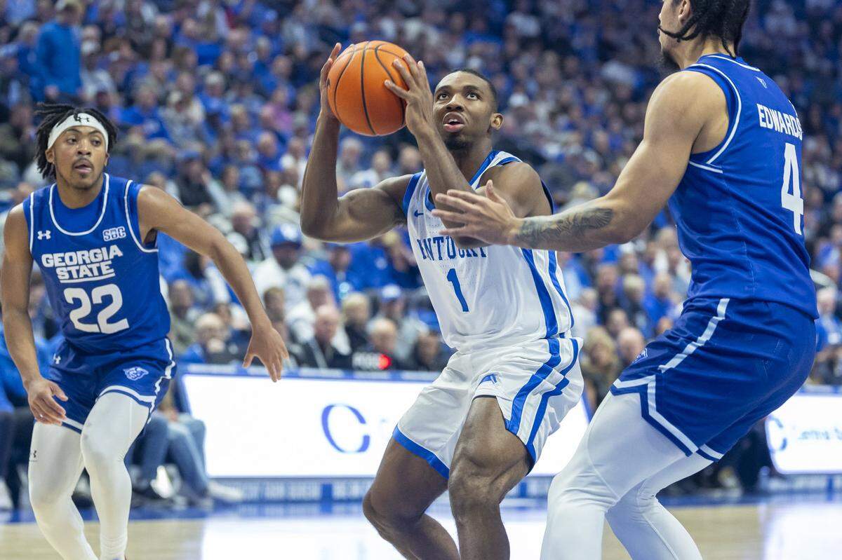 Kentucky guard Lamont Butler (1) looks to shoot the ball as Georgia State center Cesare Edwards (4) defends during Friday’s game at Rupp Arena.