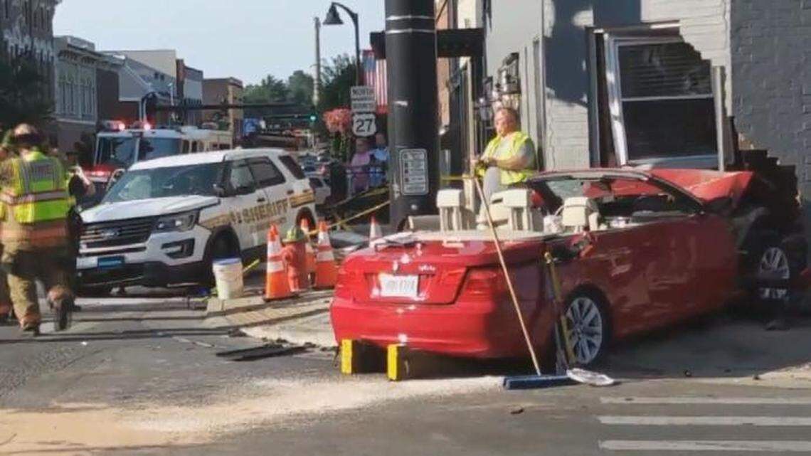 The red BMW convertible that Terry allegedly crashed into a police cruiser and a nearby building.