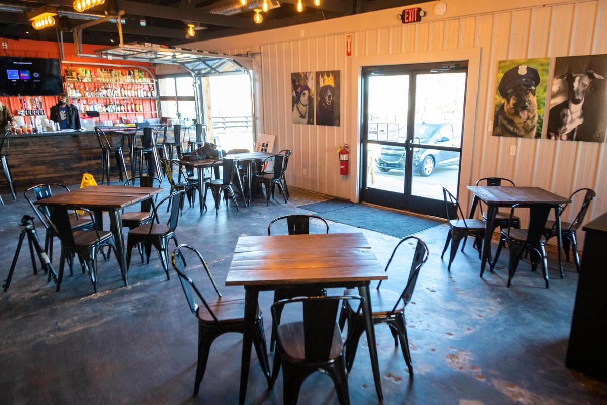 The dining room at Boonedogs, a gourmet hot dog restaurant. In addition to indoor seating they offer many picnic benches with heaters and a firepit.
