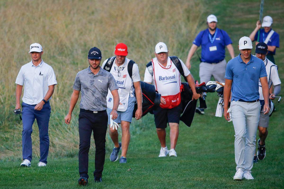 A group featuring Adam Svensson (center), Matti Schmid (right) and Max McGreevy (left) walk to the second hole during the third day of the PGA Barbasol Championship last year.