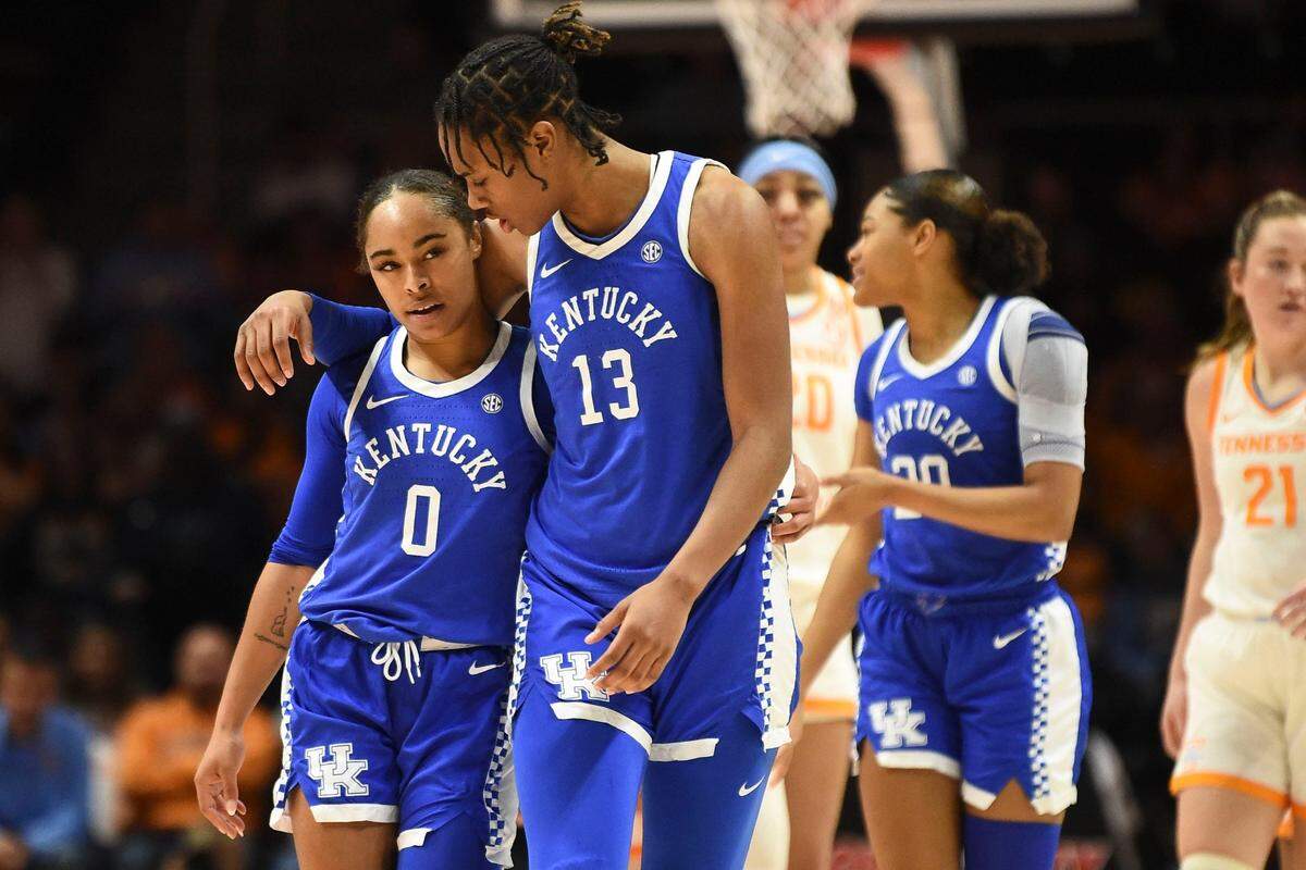 Kentucky’s Ajae Petty (13) talks with Brooklynn Miles (0) during Sunday’s game at Tennessee. Petty finished with 14 points and a game-high 14 rebounds.