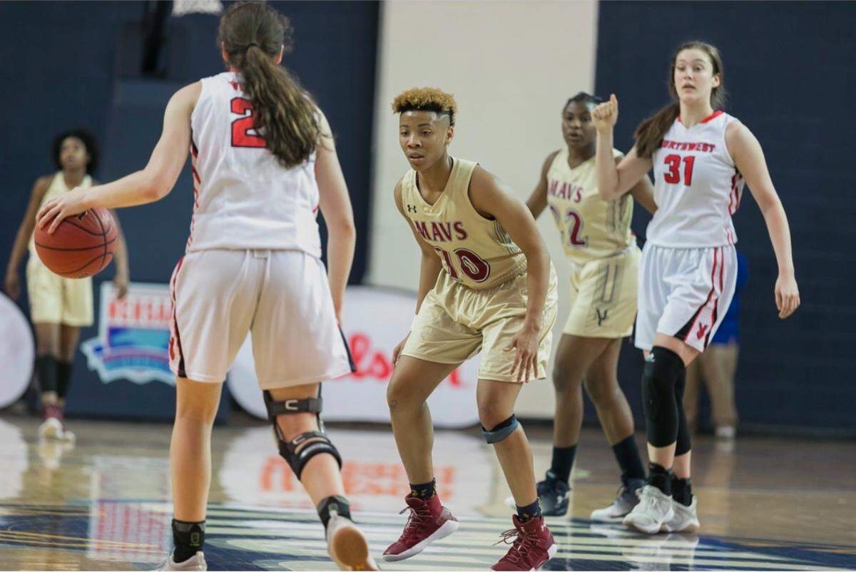 Dazia Lawrence guards former Virginia Tech guard Cayla King as Hokies legend Liz Kitley looks on in a 2018 North Carolina high school matchup between Mallard Creek and Northwest Guilford.
