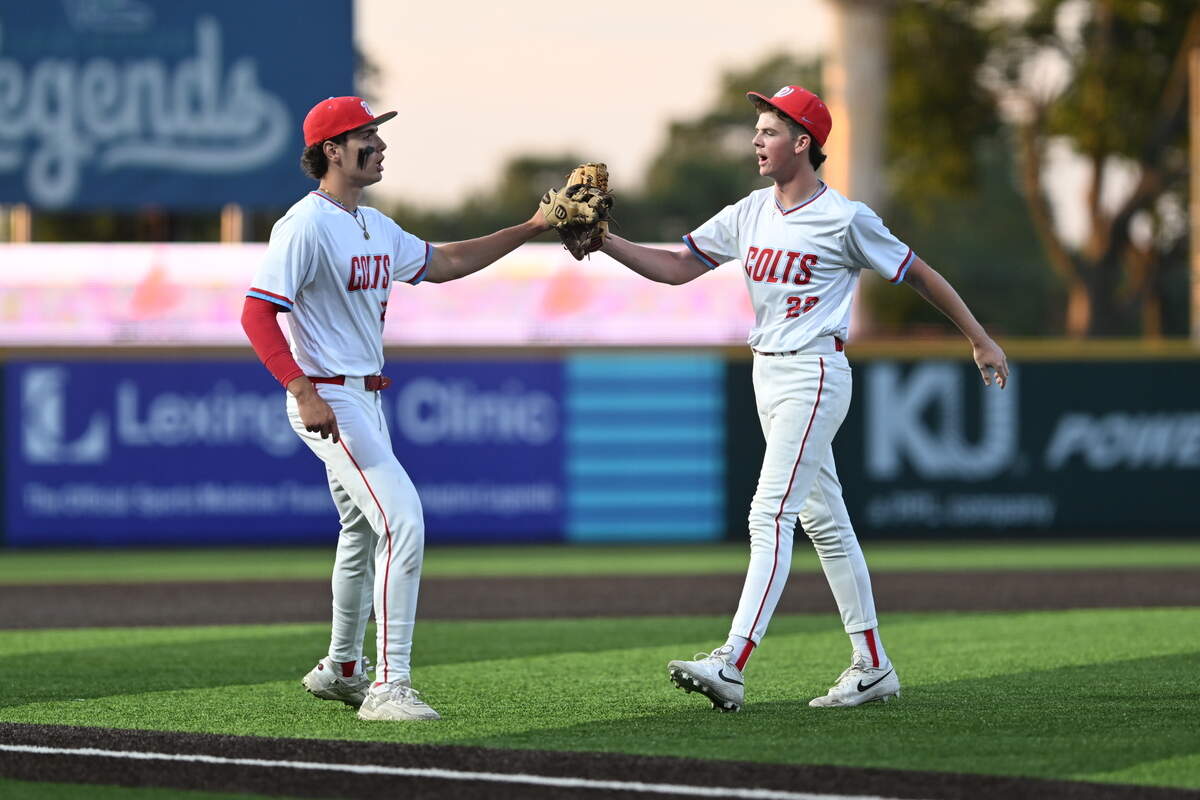 West Jessamine’s Blake Buehner, left, congratulates, starter Tyler Giles upon the completion of an inning against Beechwood during the State Baseball Tournament presented by UK HealthCare at Legends Field on Friday. Photos available for purchase via Danny Vaughn Photography.