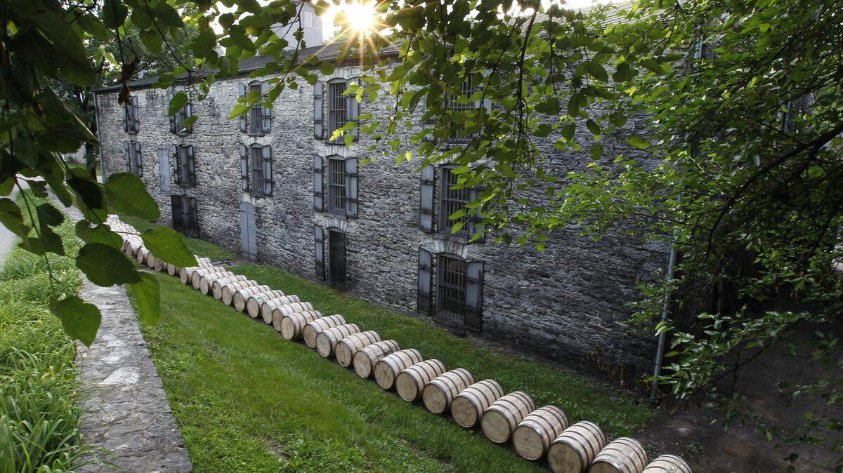 Freshly filled barrels of Woodford Reserve were rolled along the barrel rail to be placed in warehouses at the distillery near Versailles. The warehouse was built circa 1890-1892.