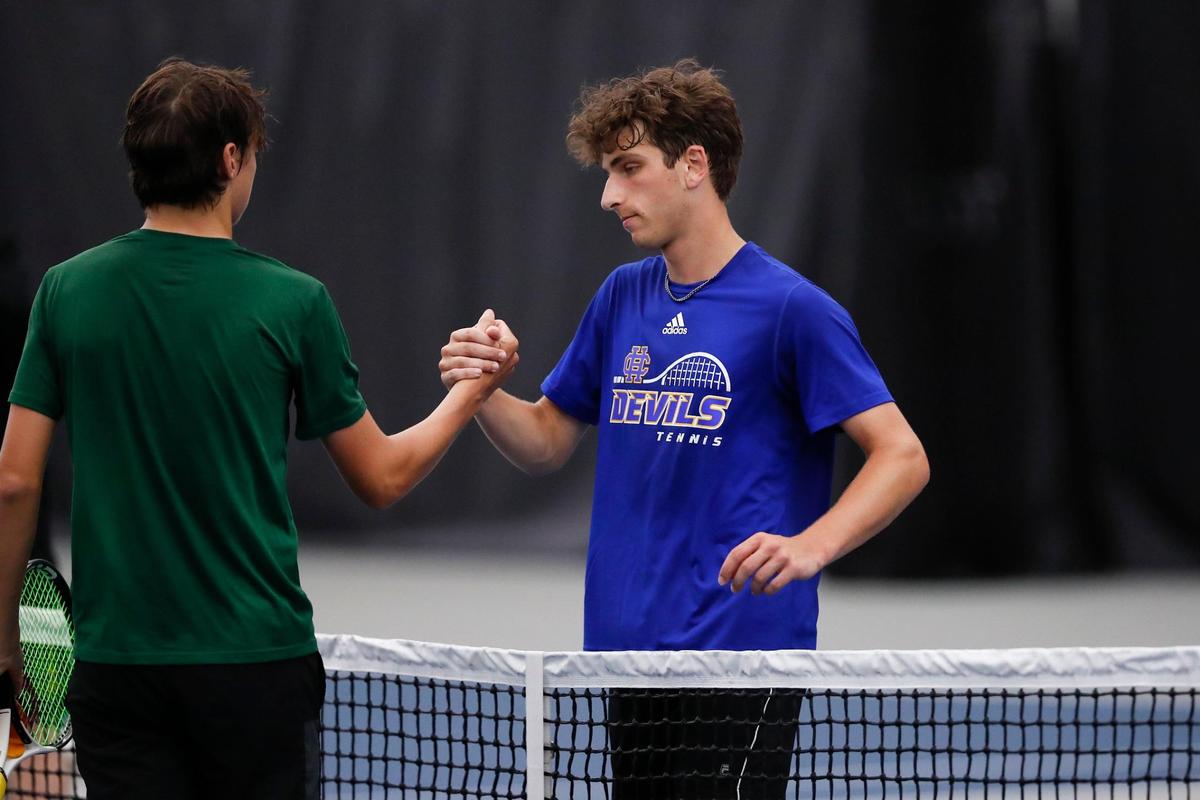 Henry Clay’s Evan Duggal congratulated St. Xavier’s Eli Stephenson following their tennis match in the boys’ state championship on Thursday.