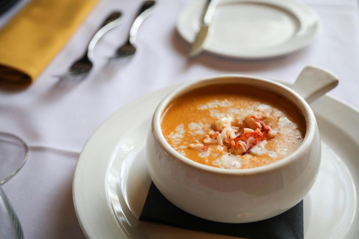 The housemade lobster bisque at La Folie is a customer favorite.