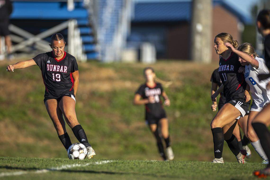 Dunbar's Lilly Taylor (19) looks to move the ball during the girls soccer 43rd District Tournament Championship against Lexington Catholic at Lexington Christian Academy in Lexington, Ky., on Thursday, Oct. 9, 2025.