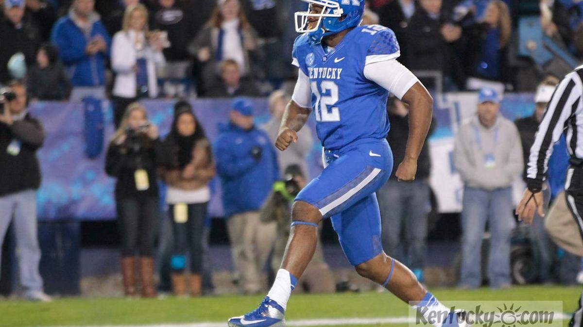 Kentucky's Morgan Newton (12) celebrated in the endzone after a touchdown in the second quarter of the Georgia at Kentucky football game at Commonwealth Stadium in Lexington, Ky., on Oct. 20, 2012. Photo by Pablo Alcala | Staff