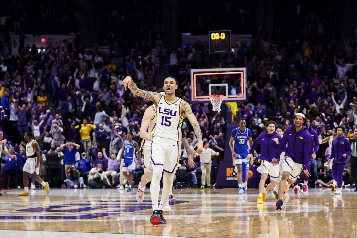 LSU forward Tyrell Ward (15) celebrates scoring the game-winning shot in a 75-74 victory over Kentucky before students and fans rush the court at the Pete Maravich Assembly Center in Baton Rouge, Louisiana.