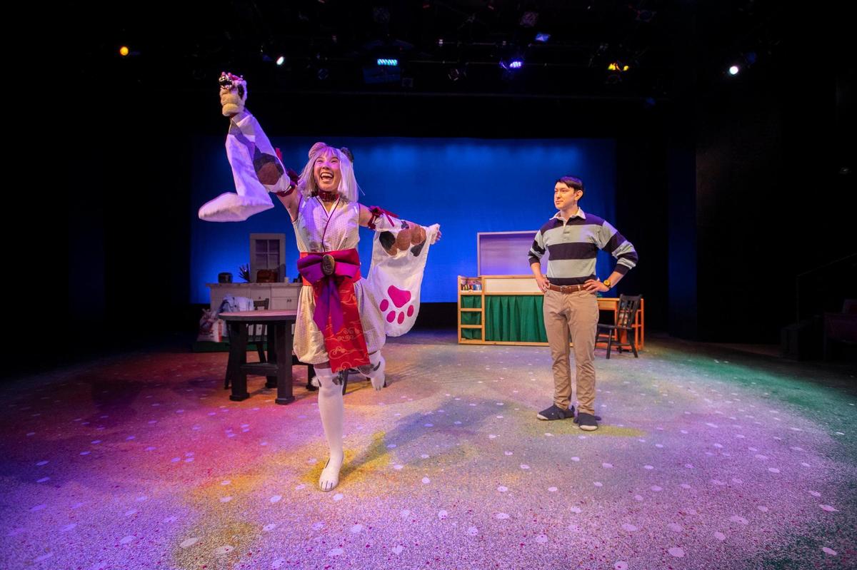 Michelle Pokopac, left, and Rusty Allen rehearse for “Shoyu Tell”, which has its world premier this weekend at the Lexington ChildrenÕs Theatre. The story is about a Japanese-American student whose lunchbox contents makes him the target of the school bully.