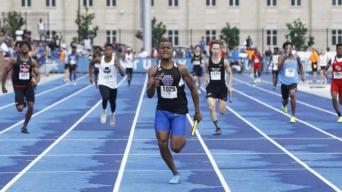 Henry Clay's Langston Jackson (center) ran the final leg of the boys 4-by-100 during the 2018 KHSAA Class 3A State Track & Field Championships on Saturday.