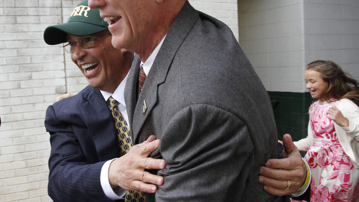 Kenny Troutt, left, and Bill Casner were all smiles on their way to the Kentucky Derby winner's circle last May 1.  