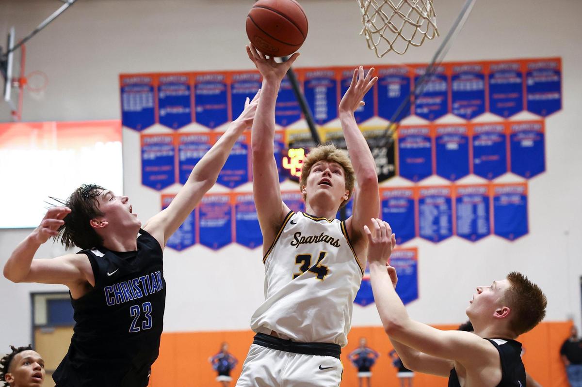 Ian Reesor (34) scored 10 of his 13 points in the second half to help lead Sayre to a come-from-behind win over Lexington Christian on Thursday night.