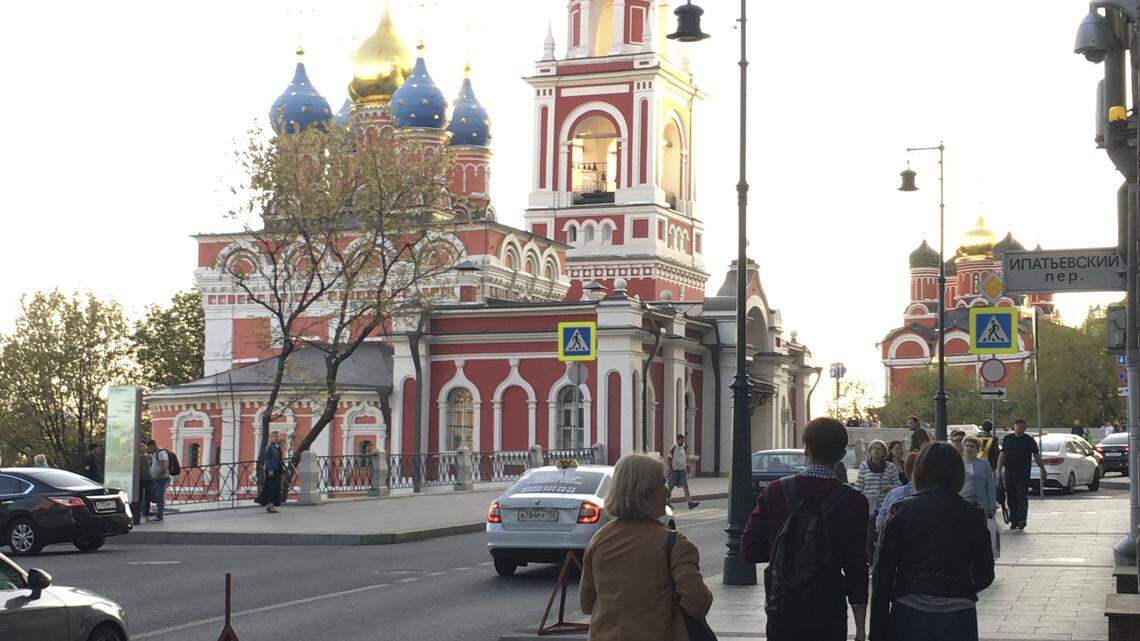 A street scene in Moscow just as the evening light illuminated this ornate church.