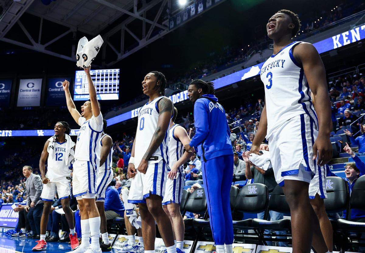 Players on the Kentucky bench celebrate their team’s win against Kentucky State during Thursday’s exhibition game at Rupp Arena.