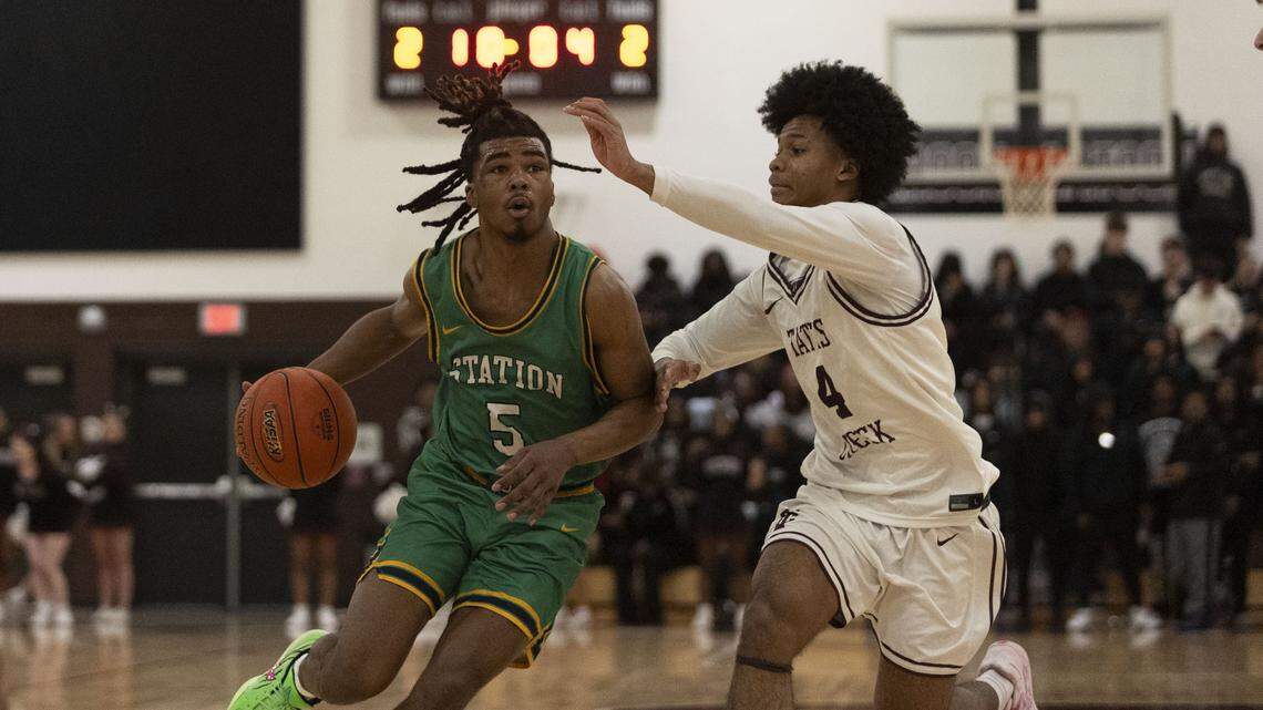 Bryan Station's Amari Owens (5) drives on Tates Creek's Stephen Franklin (4) during KHSAA boys basketball game, Thursday, Jan. 8, 2026 at Tates Creek High School in Lexington, Ky.