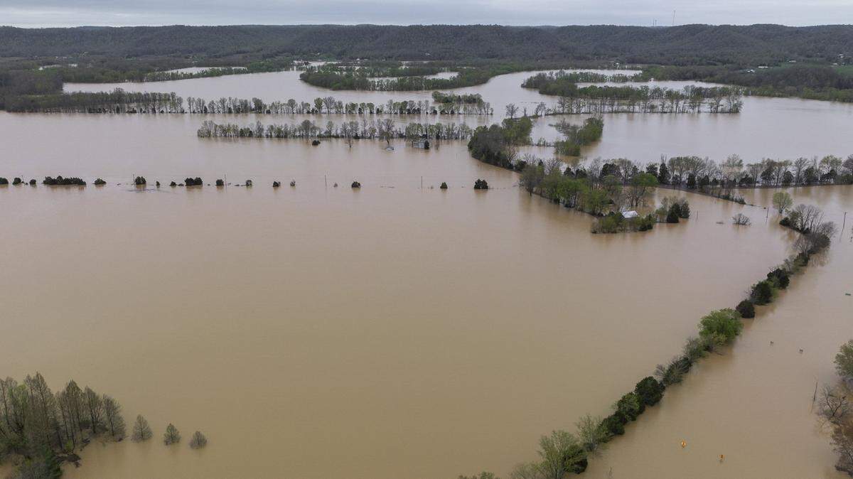 Fields, roads and structures are flooded near the Bluegrass Parkway in Nelson County, Ky., on Monday, April 7, 2025.