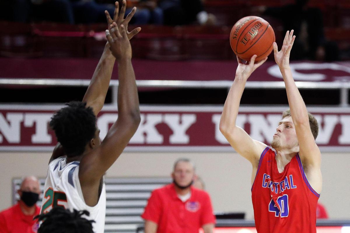 Madison Central’s Will Hardin (40) shoots over Frederick Douglass’s Shemar ORoy-Ford (25) during the 11th Region Tournament championship at McBrayer Arena in Richmond on Saturday.