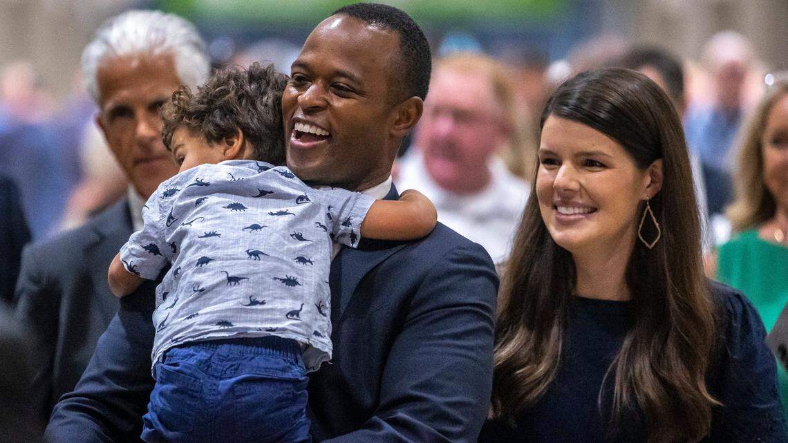Kentucky Attorney General Daniel Cameron, with his wife Makenze and son Theodore, attends the 59th Annual Country Ham Breakfast at the Kentucky Exposition Center in Louisville, Ky., on Thursday, Aug. 24, 2023.