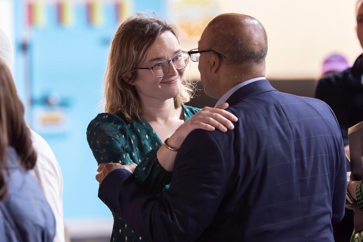 Emma Curtis, left, speaks with Kentucky state Senator Reggie Thomas (D-Lexington), after Curtis was announced the winner in Lexington’s 4th Council District during an Election Night party hosted by the Fayette County Democrats at Old North Bar in Lexington, Ky., on Tuesday, Nov. 5, 2024.